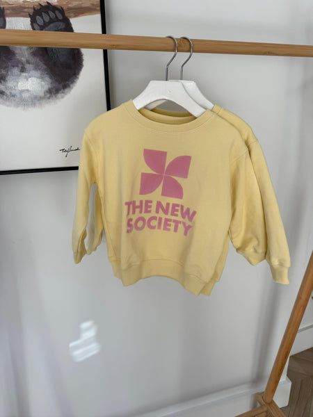 The New Society Soft Lemon TNS Logo Sweatshirt