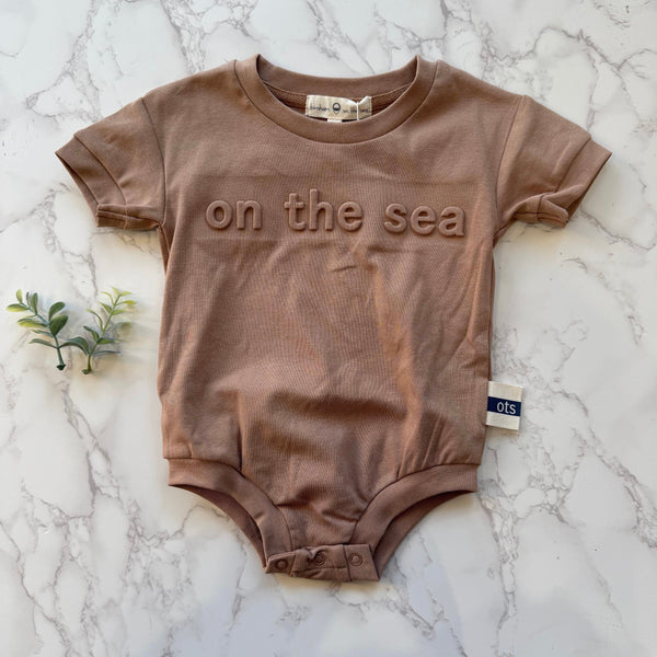 Birnham on the Sea Tan Logo Romper